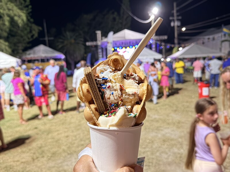 Food and a lively outdoor evening gathering in Exuma