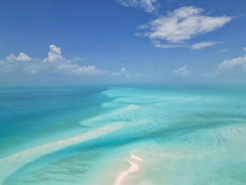 Powder-white sand beach with turquoise water in Exuma, Bahamas